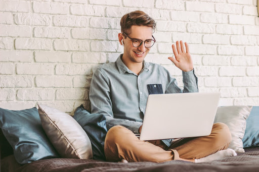 Solopreneur reviewing virtual office software